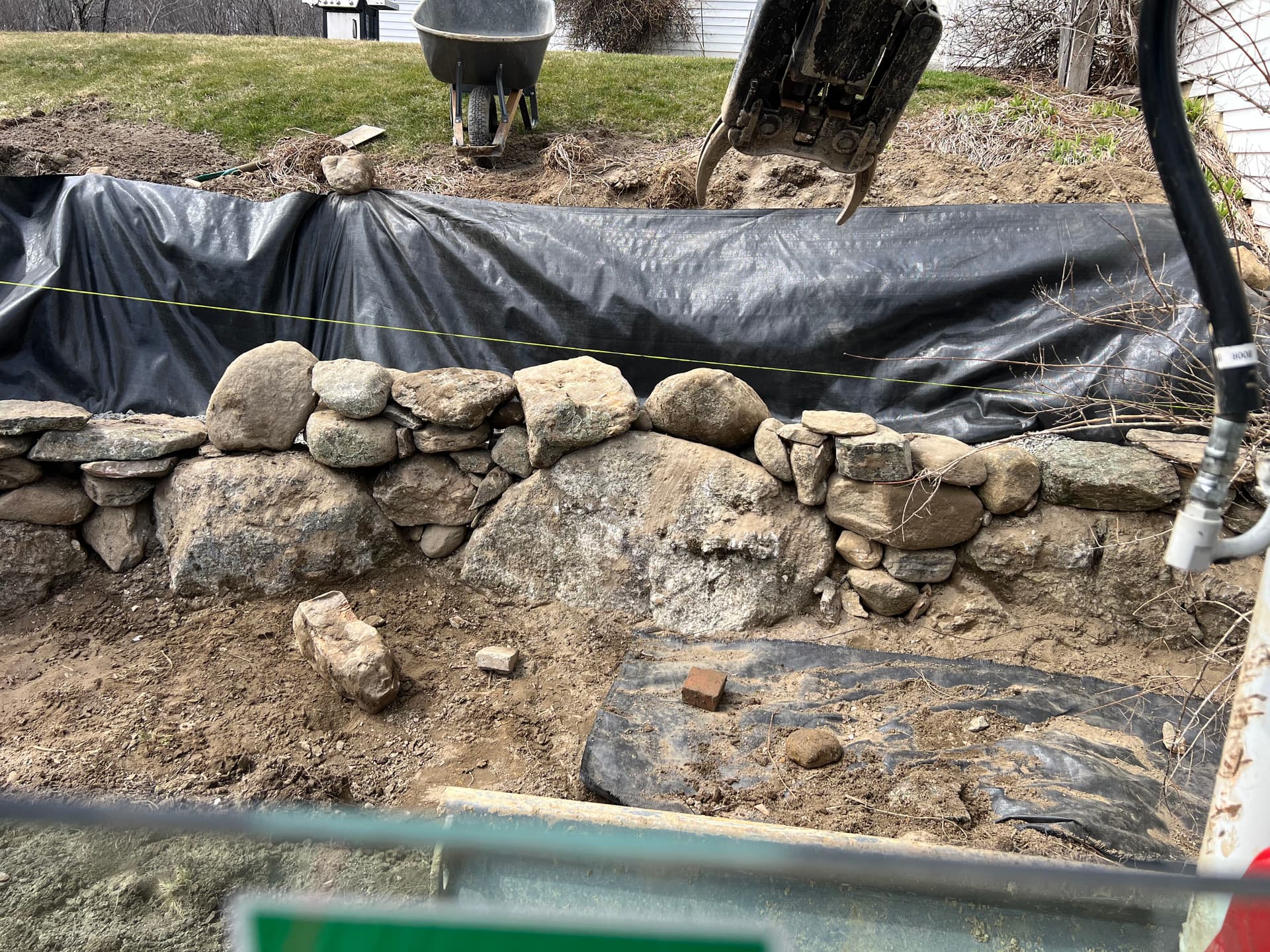 Crafting a Stone Retaining Wall with Precision