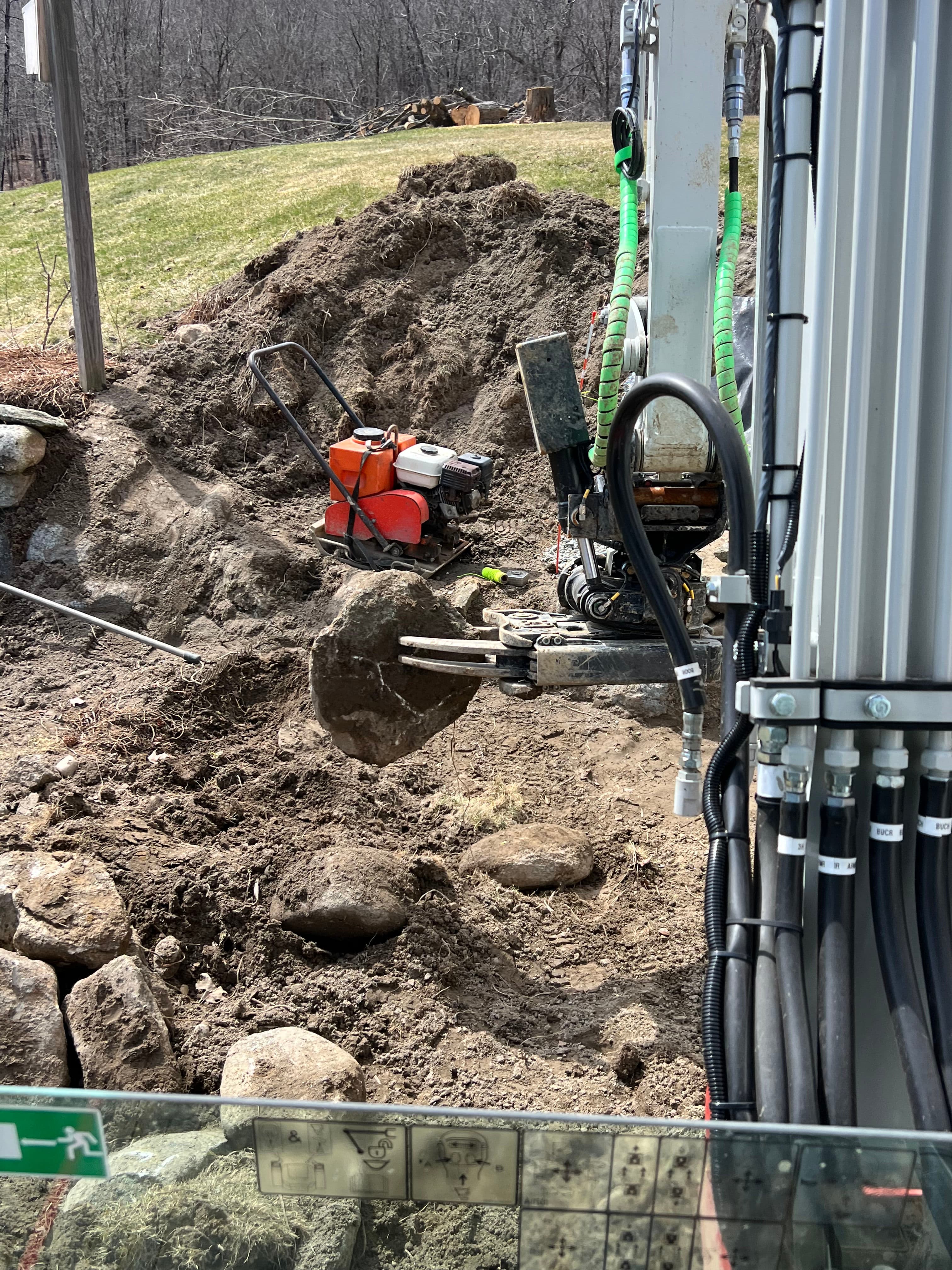 Project Crafting a Stone Retaining Wall with Precision image