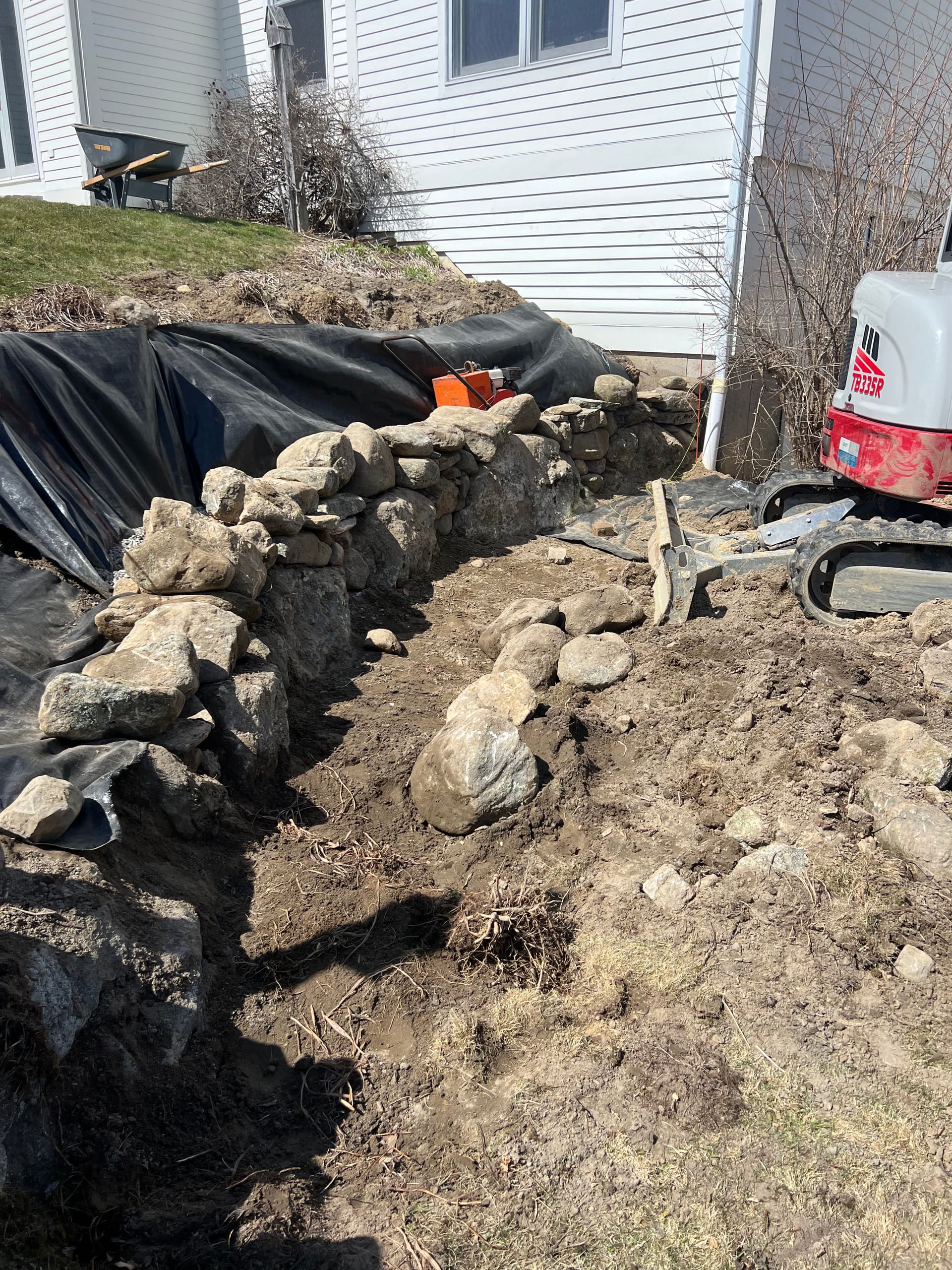 Crafting a Stone Retaining Wall with Precision