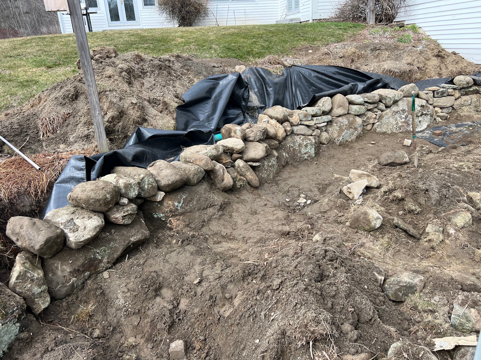 Gallery photos for Field Stone Retaining Wall Rebuild Done Right: Image #1